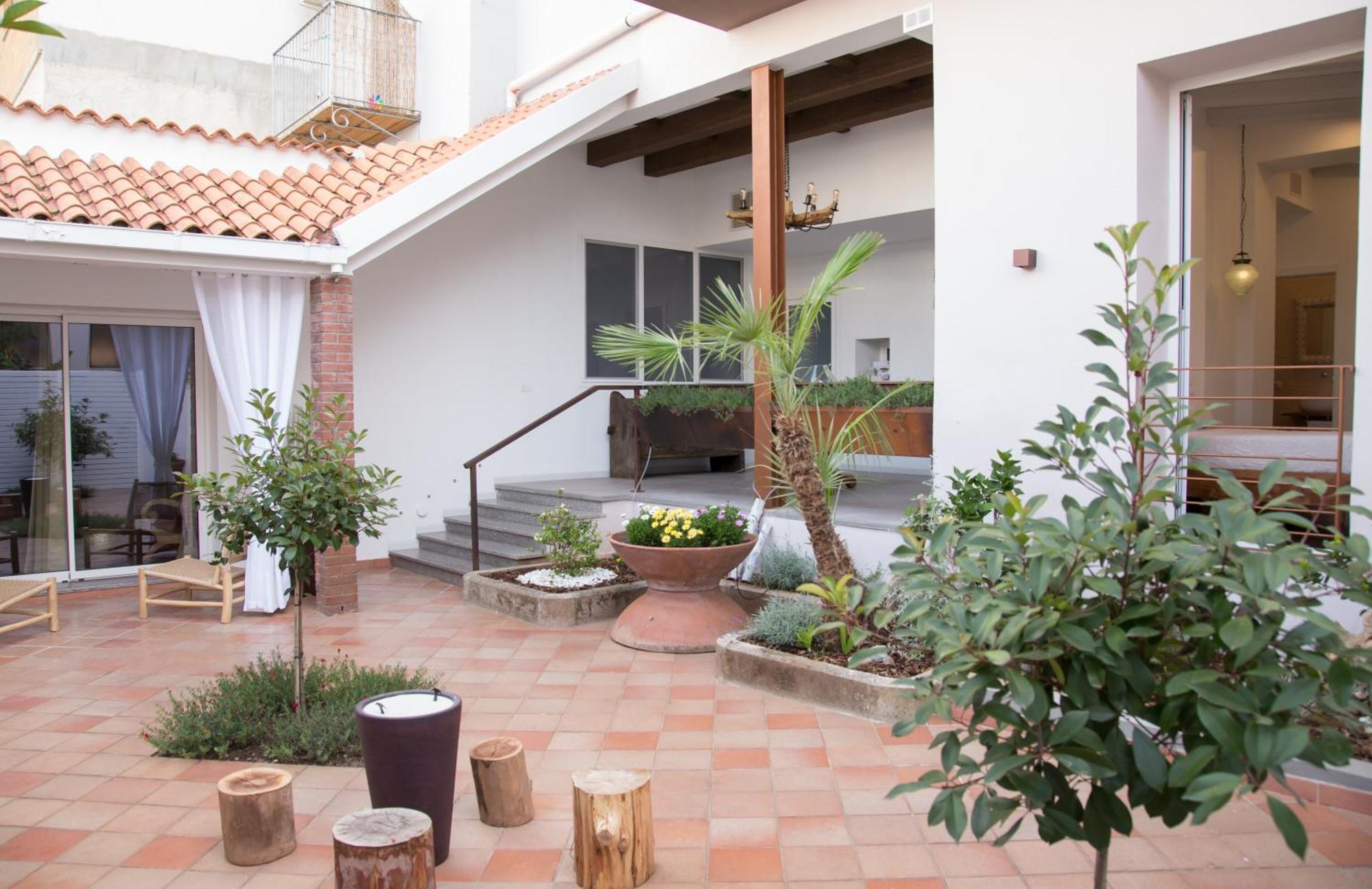 Amelia Apts & Rooms Alguer Habitación foto