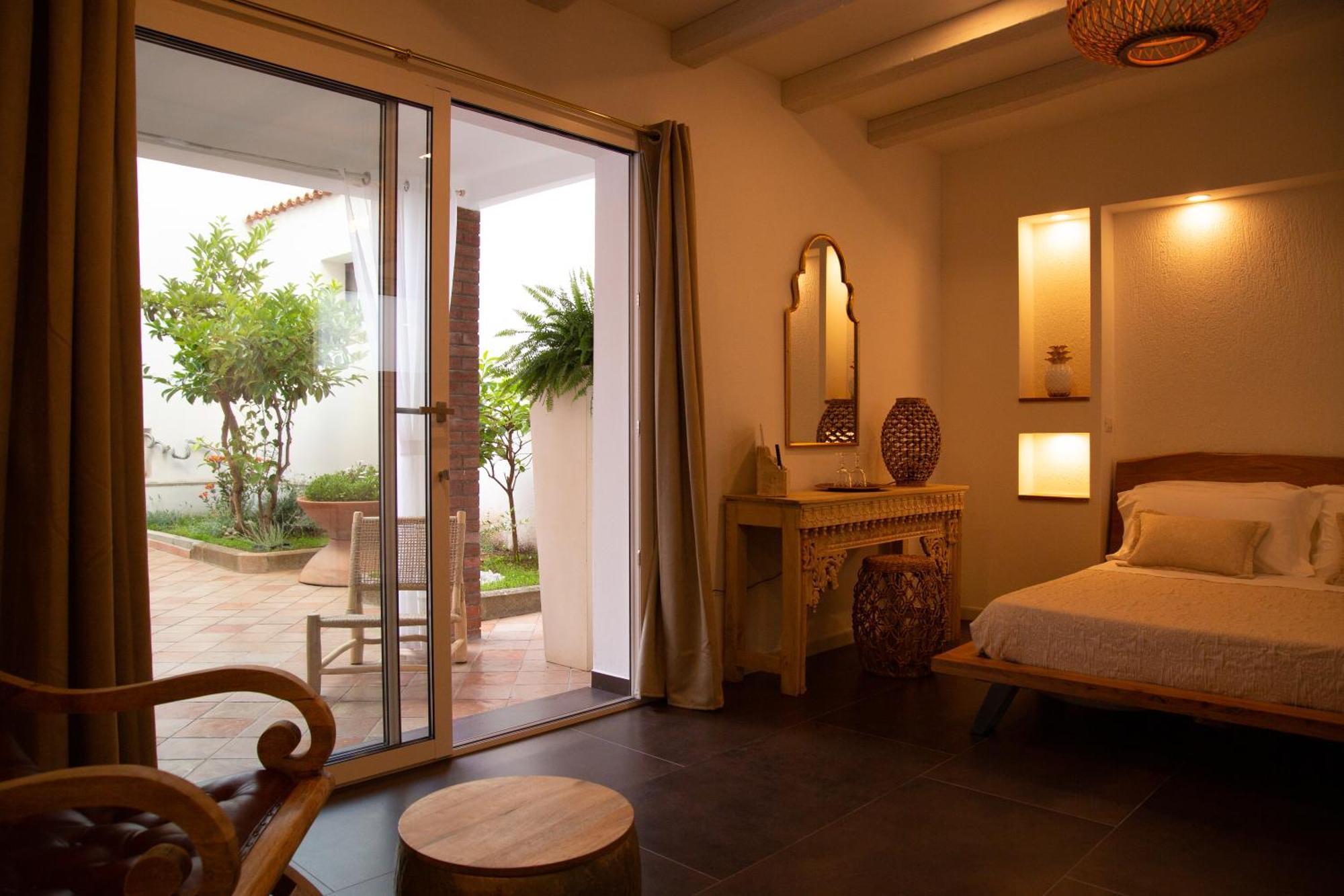 Amelia Apts & Rooms Alguer Habitación foto