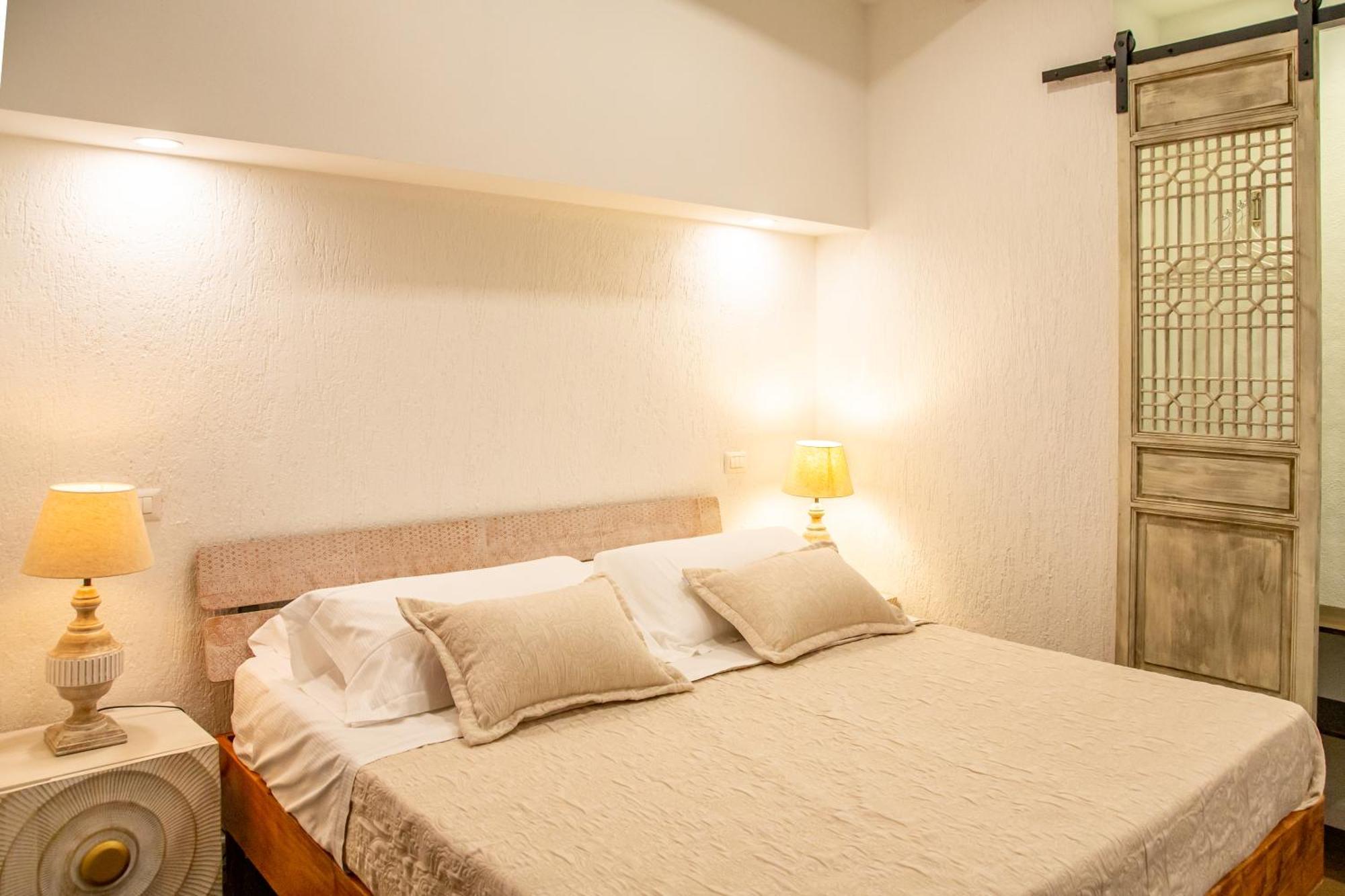 Amelia Apts & Rooms Alguer Habitación foto